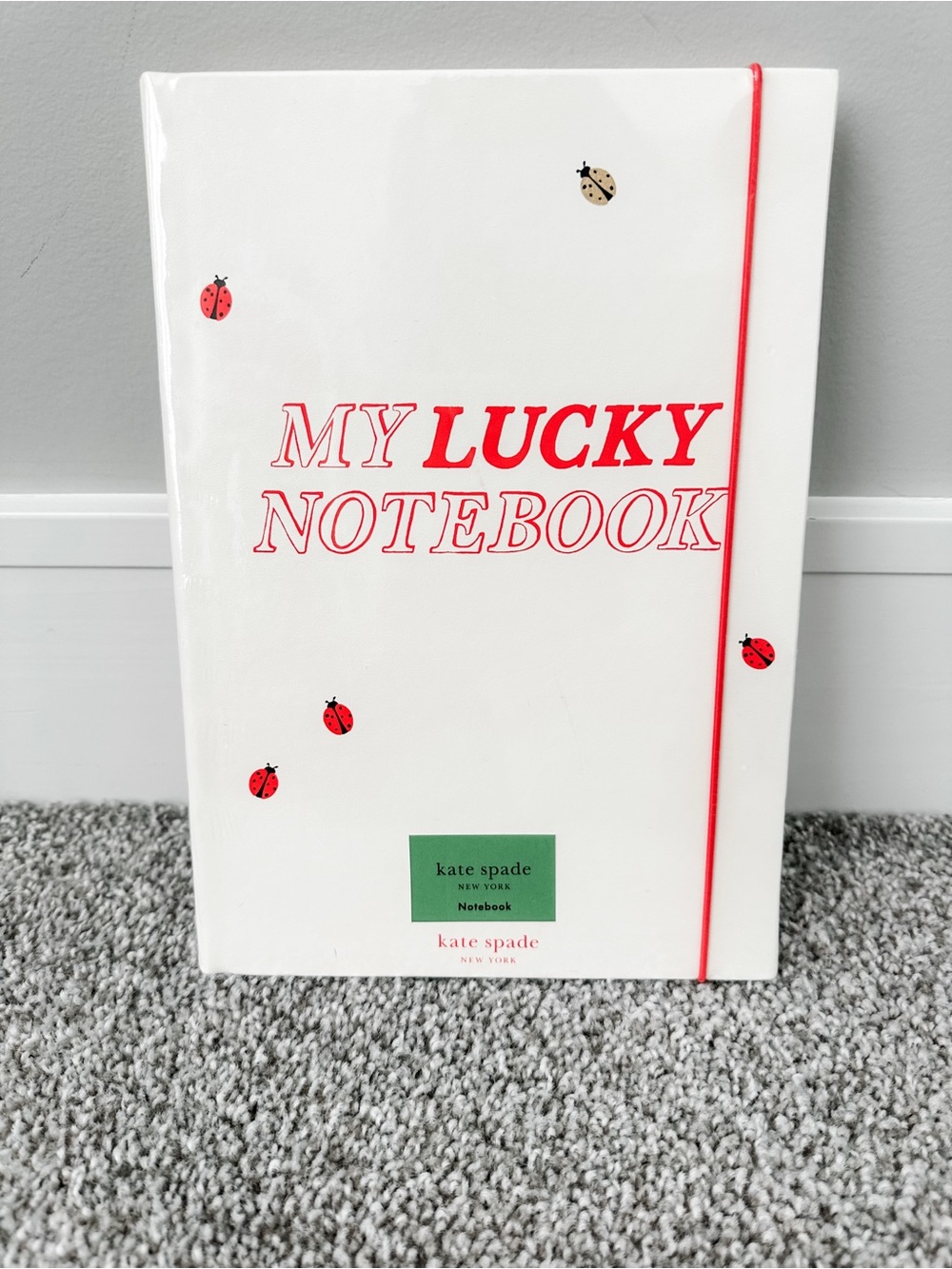NWT kate spade White Notebook with Red Accents and Ladybug Motif